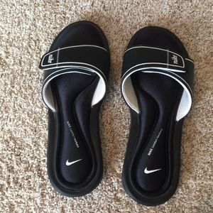 Black Nike slides